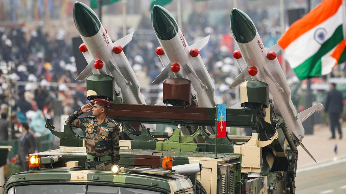 An Indian soldier salutes while standing in a vehicle during the Republic Day parade in New Delhi. Credit: Reuters Photo