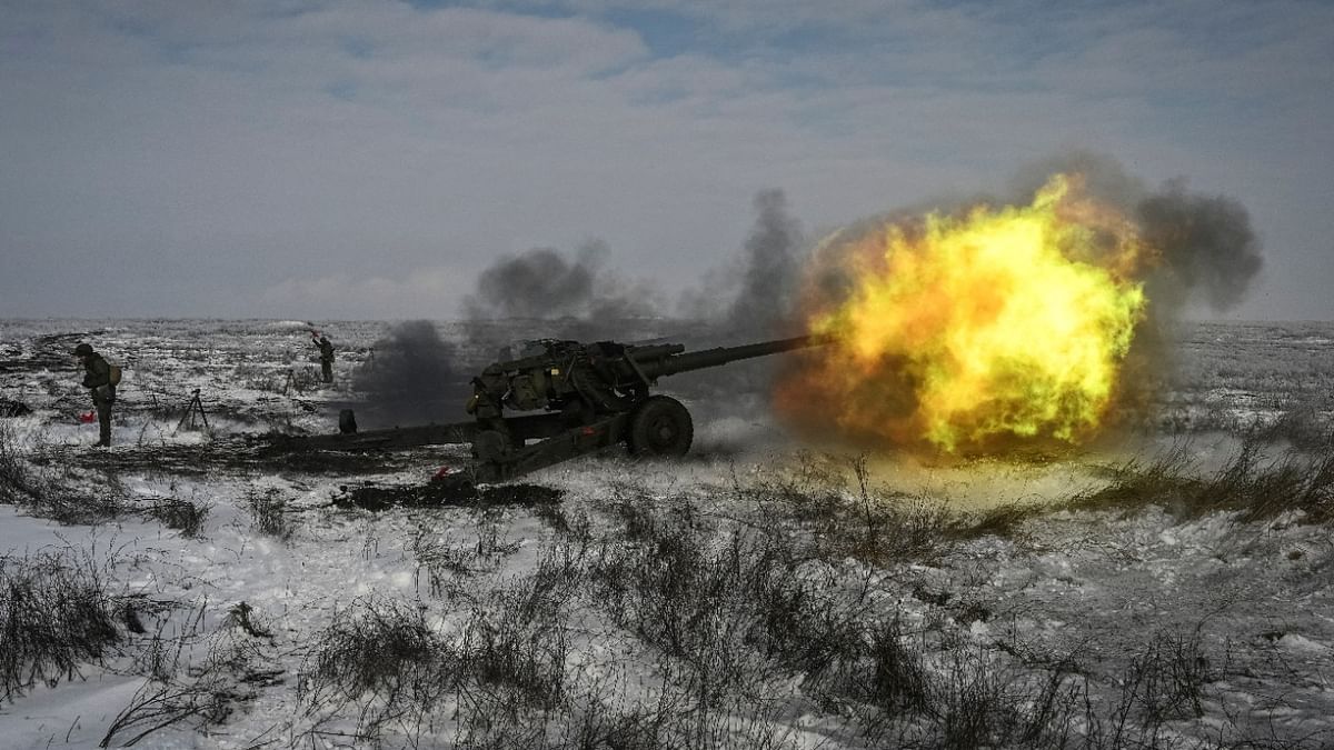 A Russian army service member fires a howitzer during drills at the Kuzminsky range in the southern Rostov region, Russia. Credit: Reuters Photo
