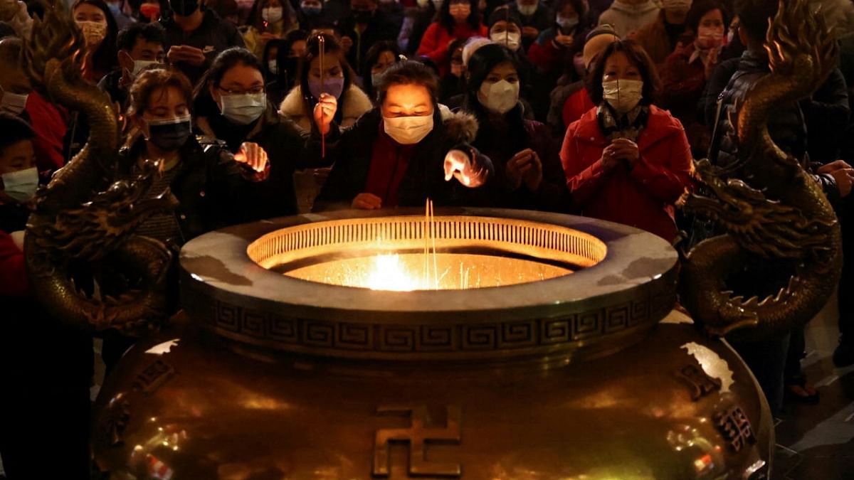 People pray at the temple to celebrate Lunar New Year in New Taipei City, Taiwan. Credit: Reuters photo