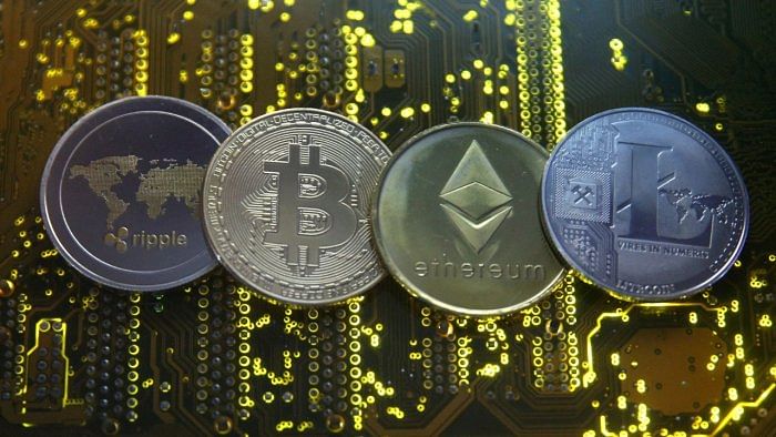 Loser | Crypto players: The decision to levy 30% tax on profits from digital asset transactions, including cryptocurrencies and non-fungible tokens, may rule out a blanket ban on such tokens for now but it will make trading in them less profitable. Credit: Reuters Photo