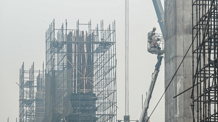 Winner | Cement, construction: The government’s plan to build more homes for low-income earners across cities will mean more contracts for cement and construction majors. Credit: AFP Photo