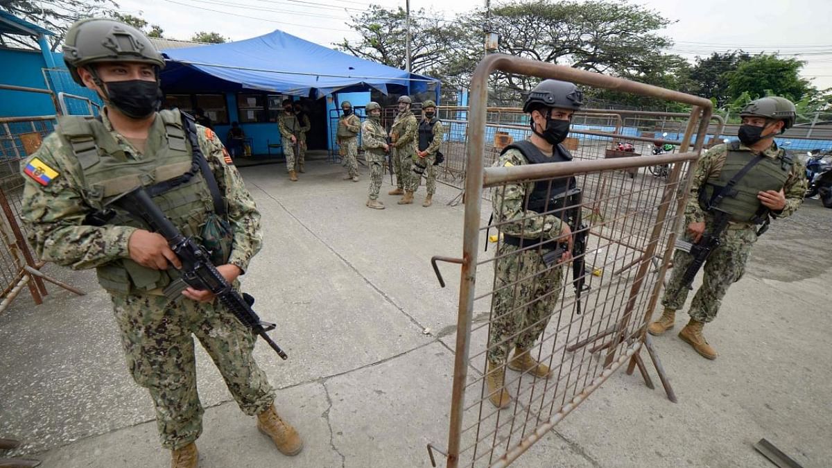 Soldiers stand guard outside the Guayas #1 prison complex in Guayaquil, Ecuador on February 2, 2022 after reports of clashes broke out between wards. Credit: AFP Photo