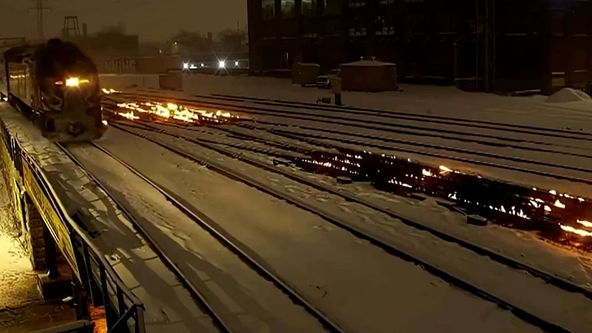 Extreme cold weather can cause steel to contract, causing breaks on train tracks and to avoid this official put the train tracks on fire. This prevents train derailment caused by metal deformations. Credit: Reuters Photo