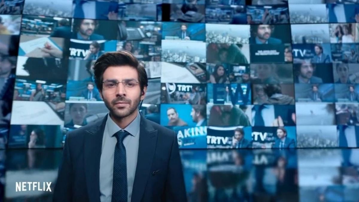 Dhamaka: When a cynical ex-TV news anchor (Kartik Aaryan) gets an alarming call on his radio show, he sees a chance for a career comeback — but it may cost him his conscience. Credit: Netflix