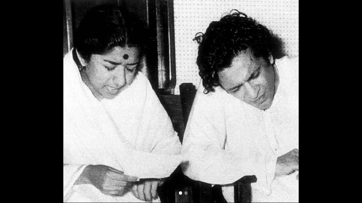 Mangeshkar leaves a legacy of tens of thousands of songs, mostly in Hindi but also in several other Indian languages. Pandit Ravi Shankar and Lata Mangeshkar are seen in the photo. Credit: Instagram/@lata_mangeshkar