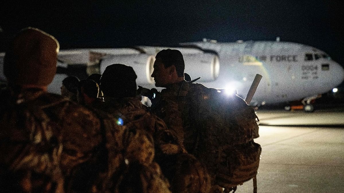 Paratroopers assigned to the 82nd Airborne Division prepare to depart Fort Bragg for the US European Command area of responsibility at Pope Army Airfield, North Carolina. Credit: AFP Photo