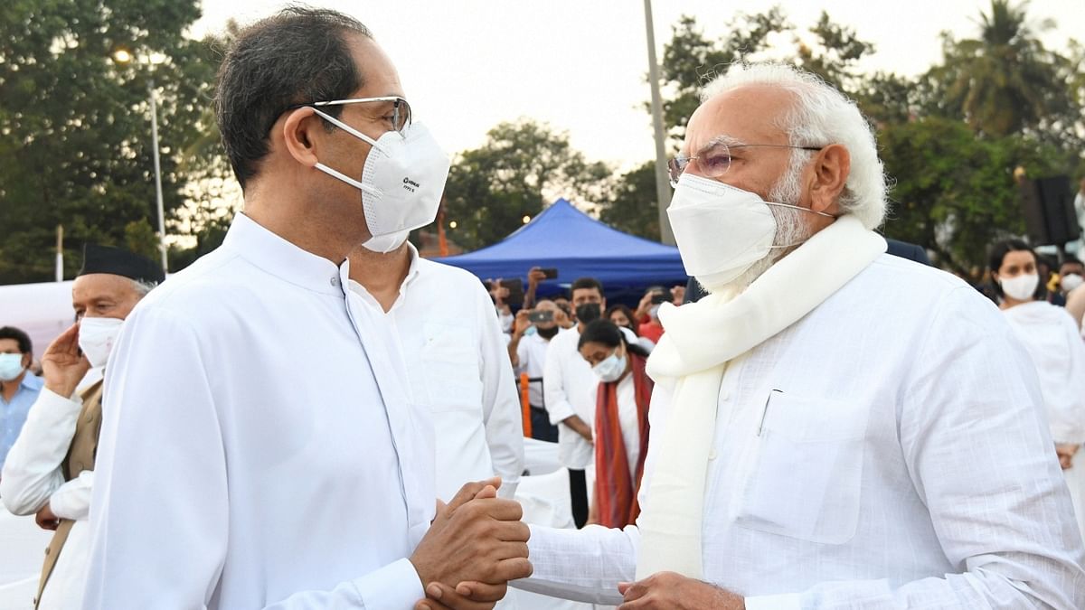 Prime Minister Narendra Modi interacts with Maharashtra CM Uddhav Thackeray at Lata Mangeshkar's funeral at Shivaji Park in Mumbai. Credit: PMO