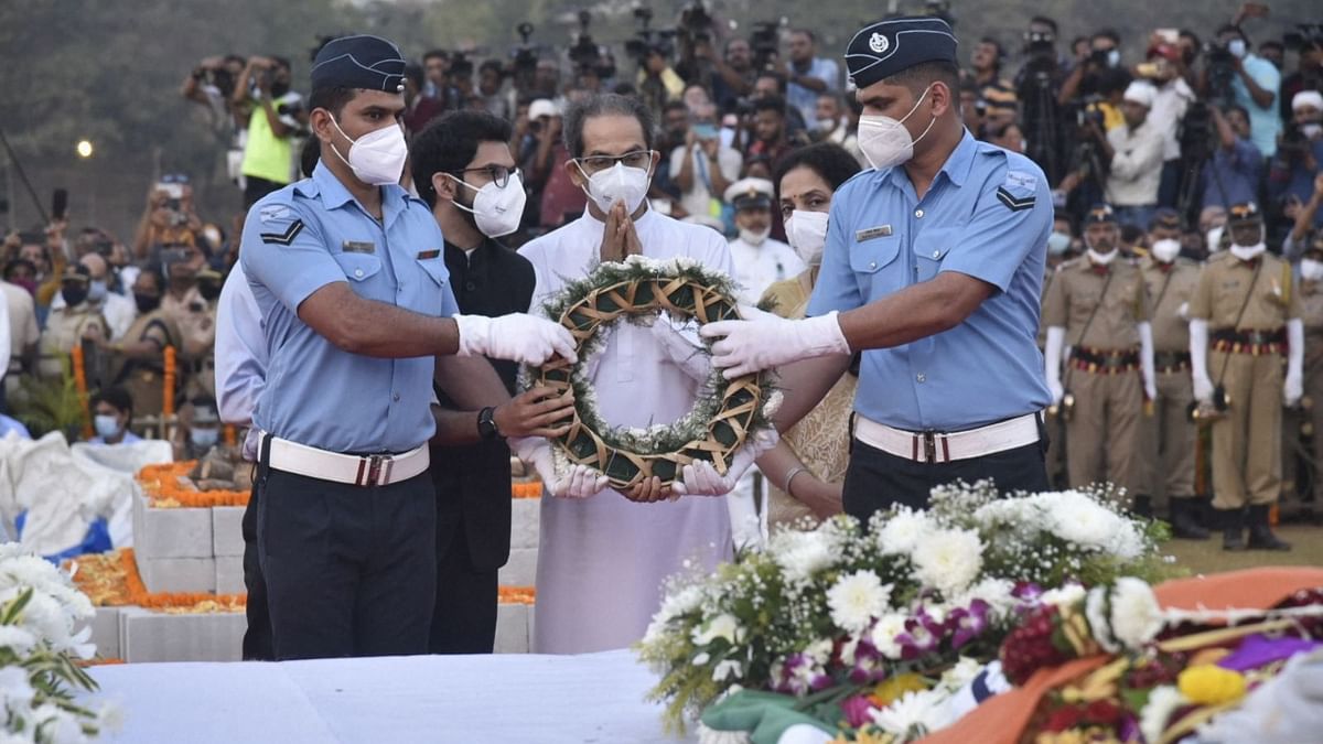 Maharashtra CM Uddhav Thackeray pays tribute to legendary singer Lata Mangeshkar during her funeral at Shivaji Park in Mumbai. Credit: Twitter/@OfficeofUT