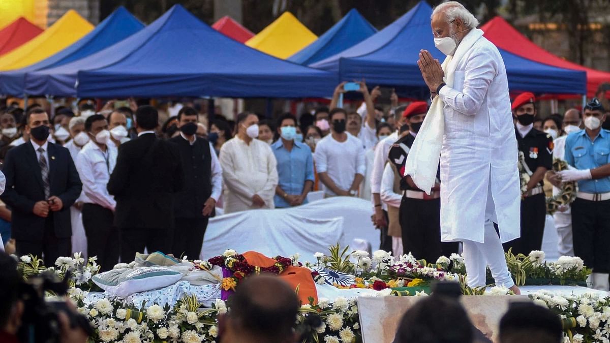 Prime Minister Narendra Modi offers his last respects to the late Bollywood singer Lata Mangeshkar at the state funeral ceremony in Mumbai. Credit: AFP Photo
