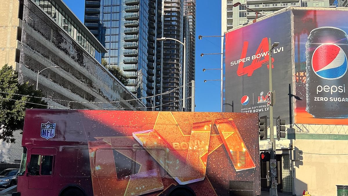 Signage for Super Bowl LVI on display with Super Bowl tour bus in Downtown Los Angeles. Credit: USA Today Sports
