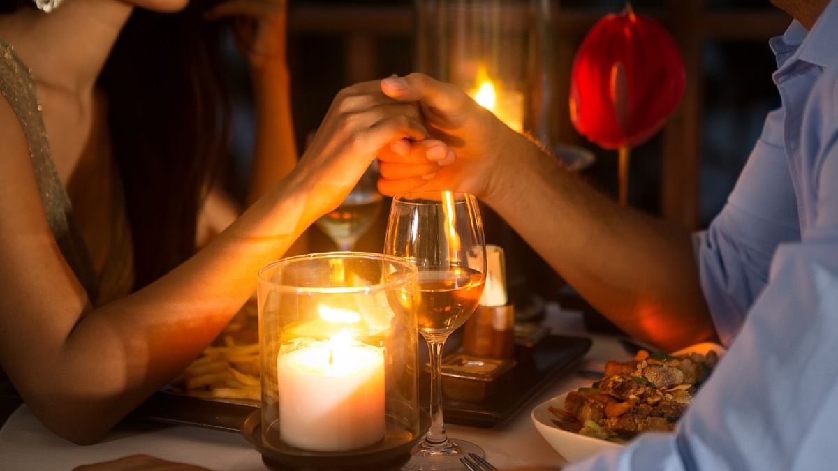 Set up romantic dates at home: Surprise by setting up a home date by creating the right atmosphere. With the ambient LED lights, candles and aroma oil diffusers, one can create memories worth a lifetime. Credit: Getty Images
