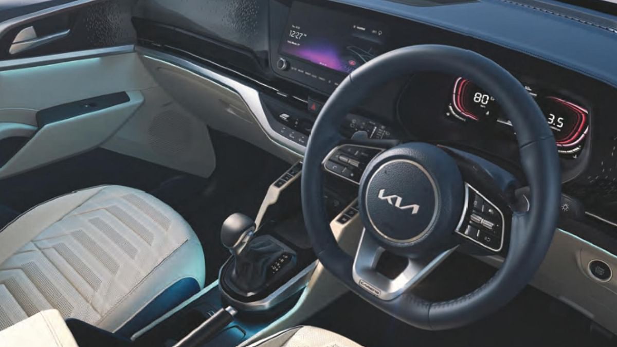 The Carens also comes equipped with flexible seating options and features such as the sliding type seat undertray, retractable seat back table, the rear door spot lamp, and bottle and gadget holder in the third row. Credit: Kia India