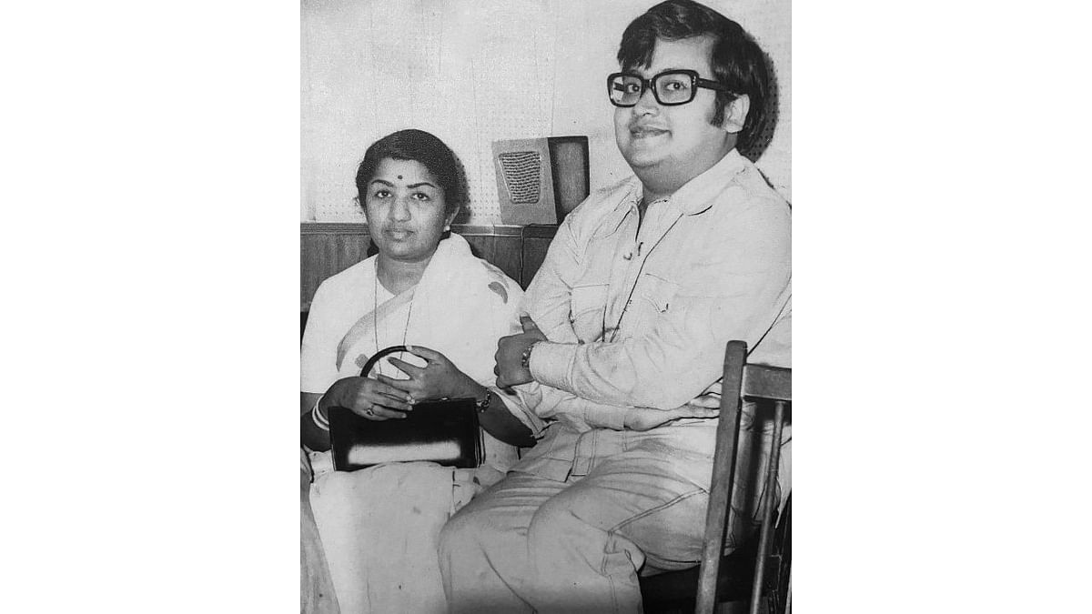 Bappi had a close bond with Lata Mangeshkar. Here is a picture of them at a recording studio. Credit: Instagram/bappilahiri_official_