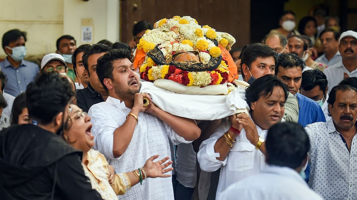 The mortal remains of the singer-composer left his Mumbai residence for the final rites that took place at Pawan Hans, Santacruz, in Mumbai. Credit: PTI Photo