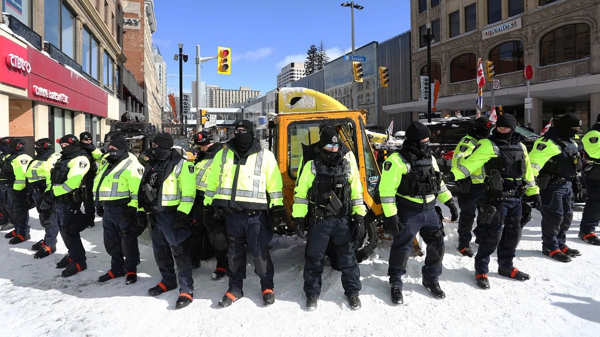 Police deploy to remove demonstrators against Covid-19 mandates in Ottawa. Credit: AFP Photo