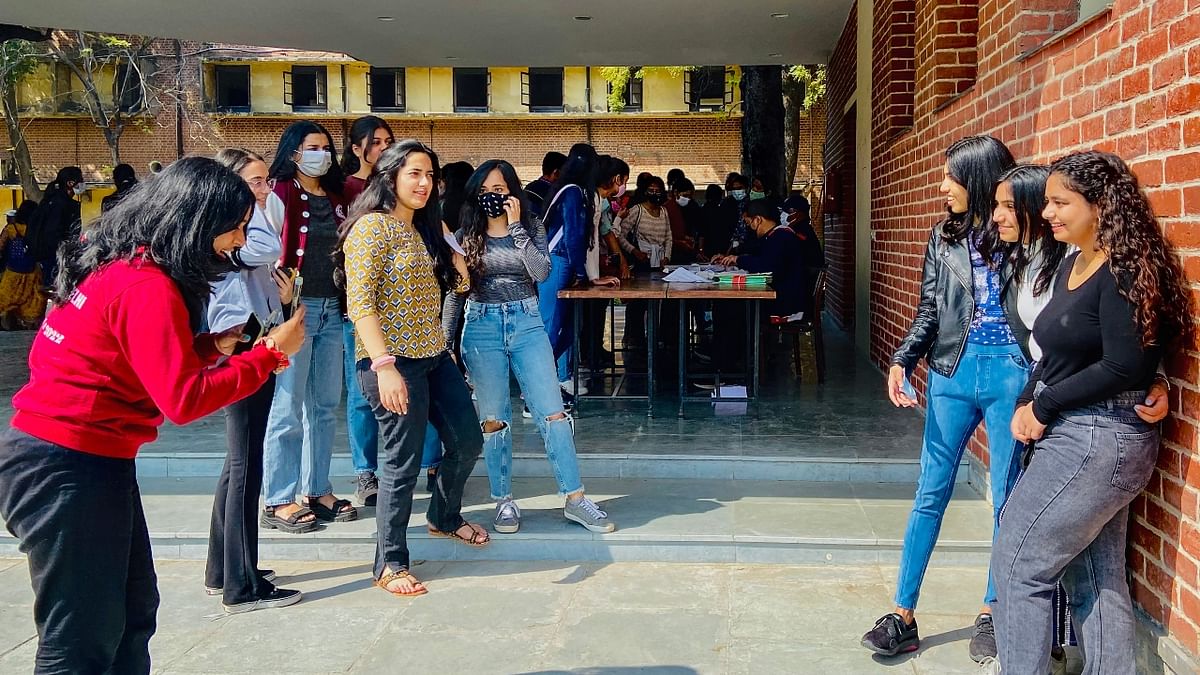 Students click photos as the bond with their friends. Credit: PTI Photo