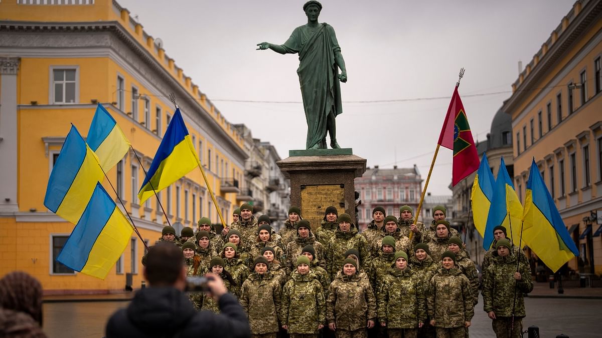 Ukrainian Army soldiers pose for a photo as they gather to celebrate a Day of Unity in Odesa, Ukraine. Credit: AP Photo