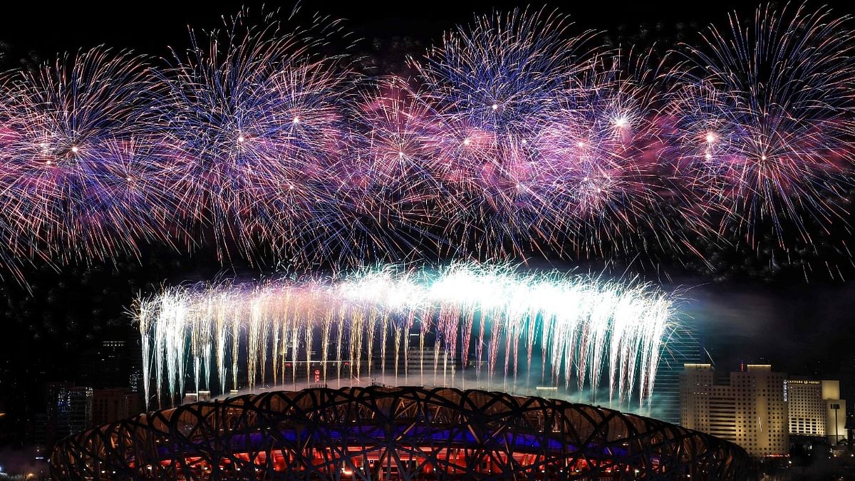 Fireworks illuminate the night sky during the closing ceremony of the Beijing 2022 Winter Olympic Games, at the National Stadium, known as the Bird's Nest, in Beijing. Credit: AFP Photo