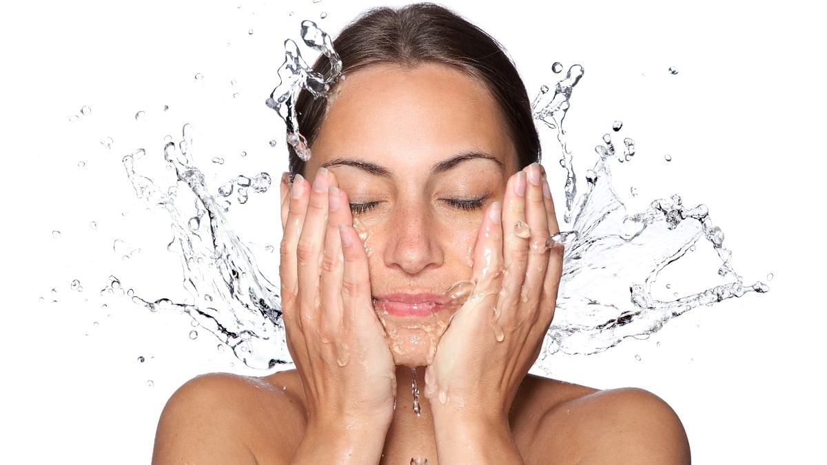 Wash your face more than usual as it will help in preventing acne, bumps, whiteheads, and blackheads making your skin look unhealthy. Credit: Getty Images