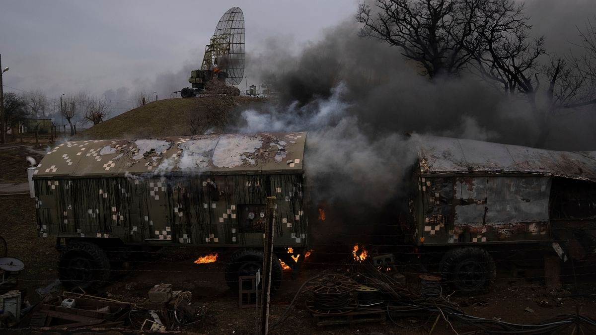 Smoke rise from an air defence base in the aftermath of an apparent Russian strike in Mariupol, Ukraine. Credit: AP Photo