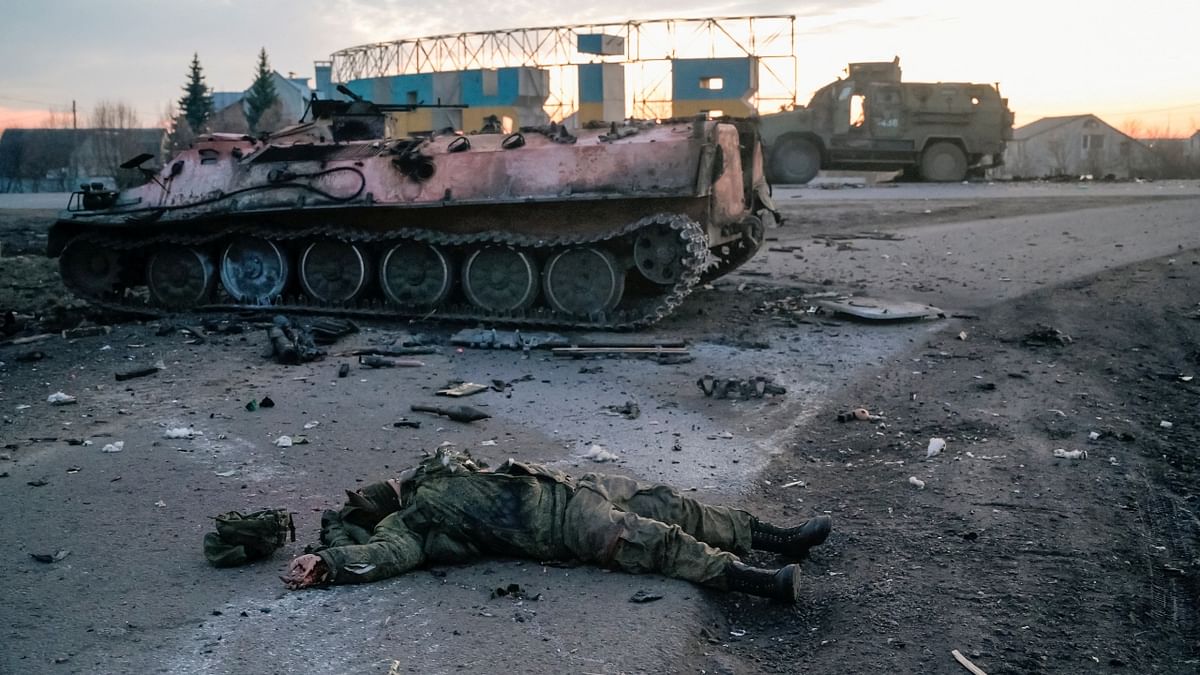 Ukraine's government said Russian tanks and troops rolled across the border in a “full-scale war” that could rewrite the geopolitical order, whose fallout already reverberated around the world. In this photo, an injured Russian army serviceman lies on a road outside the city of Kharkiv, Ukraine. Credit: Reuters Photo