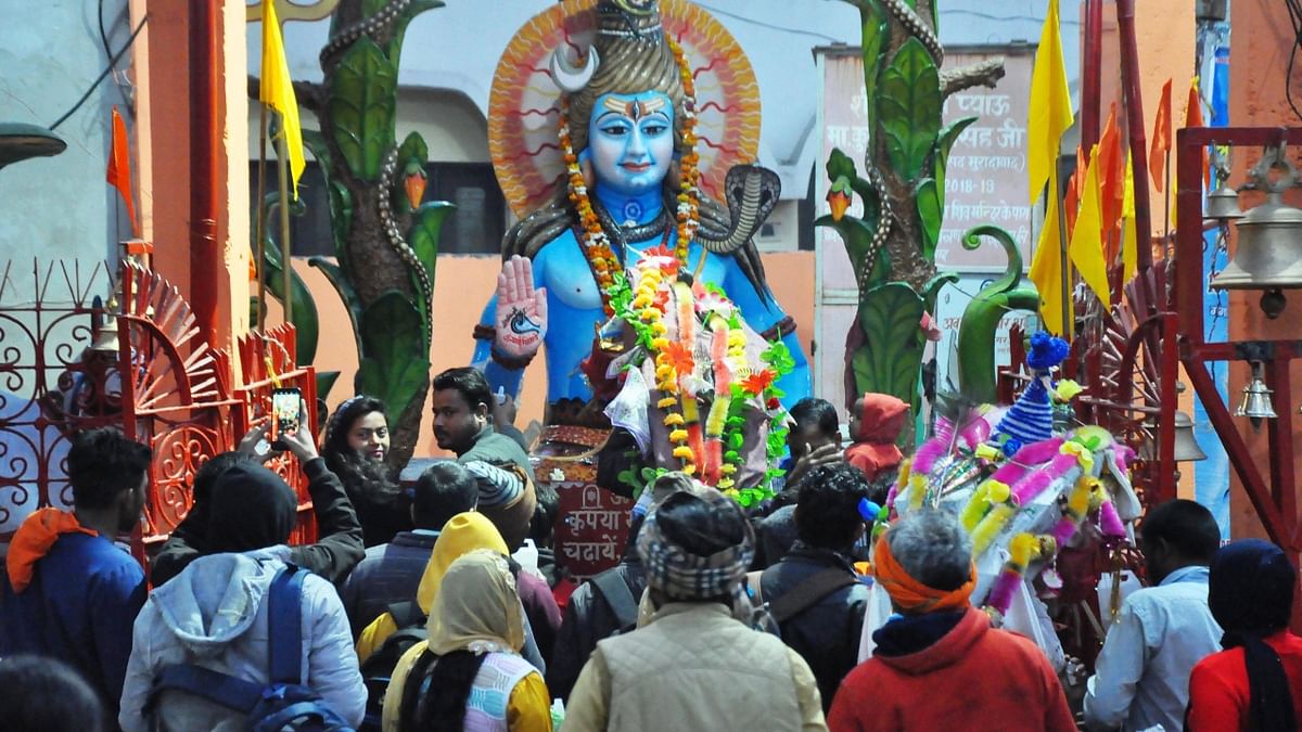 Devotees in large numbers offer prayers at a Shiv temple on the occasion of Maha Shivratri, in Moradabad. Credit: PTI Photo