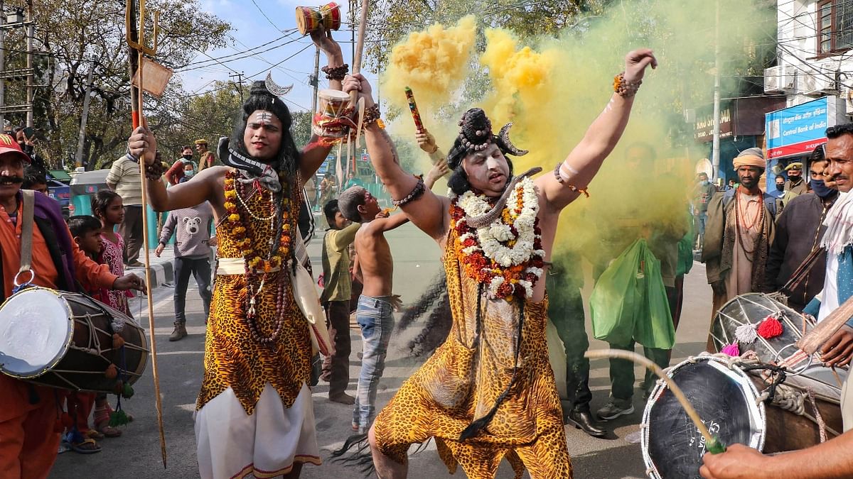 Devotees dressed as Lord Shiva participates in a procession during the Shivratri celebrations, in Jammu. Credit: PTI Photo