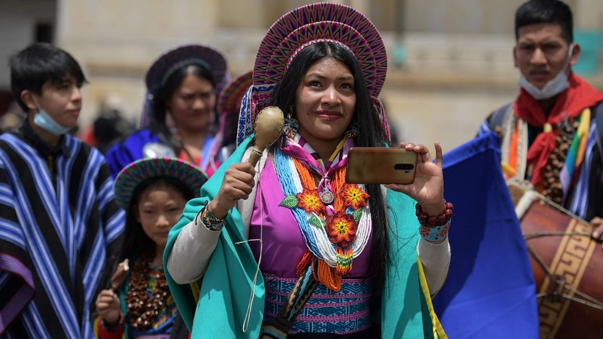 A member of the Inga indigenous community is seen during a ceremony at the Bolivar square in Bogota, on March 3, 2022. Credit: AFP Photo