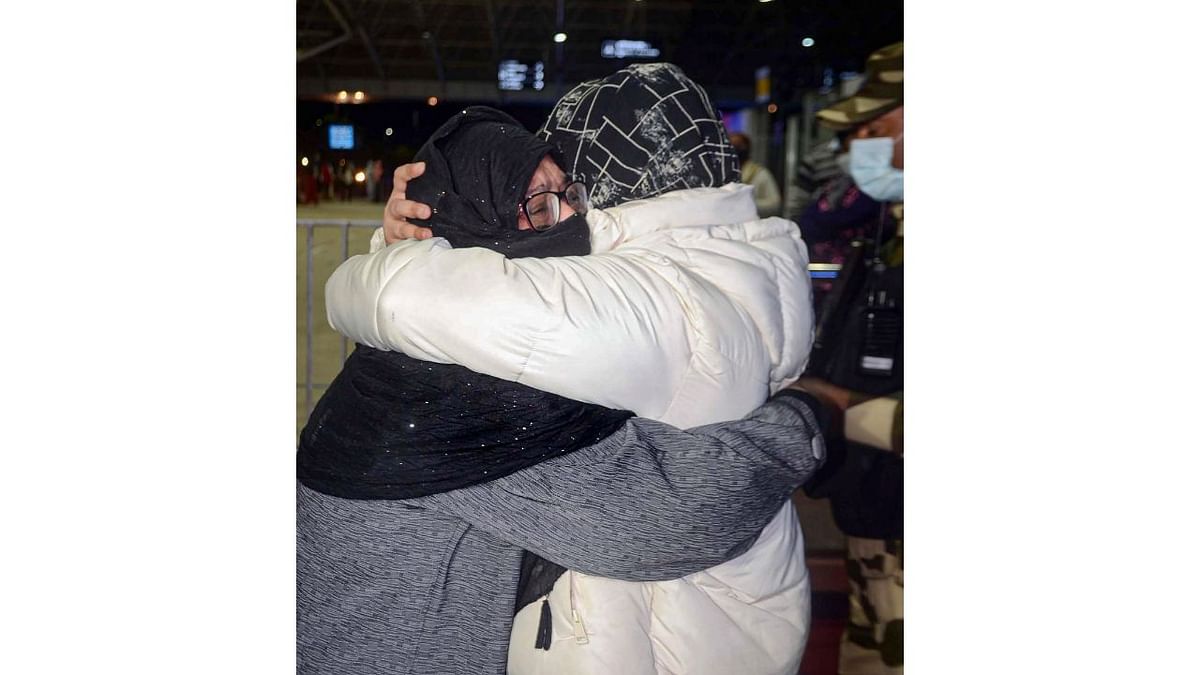 A student hugs her family member on her arrival at the Birsa Munda International Airport in Ranchi. Credit: PTI Photo