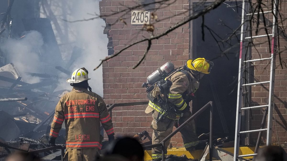 Ten people were taken to hospitals, including several people with serious injuries, after an explosion and fire at a Maryland apartment building, a fire official said. Credit: AFP Photo