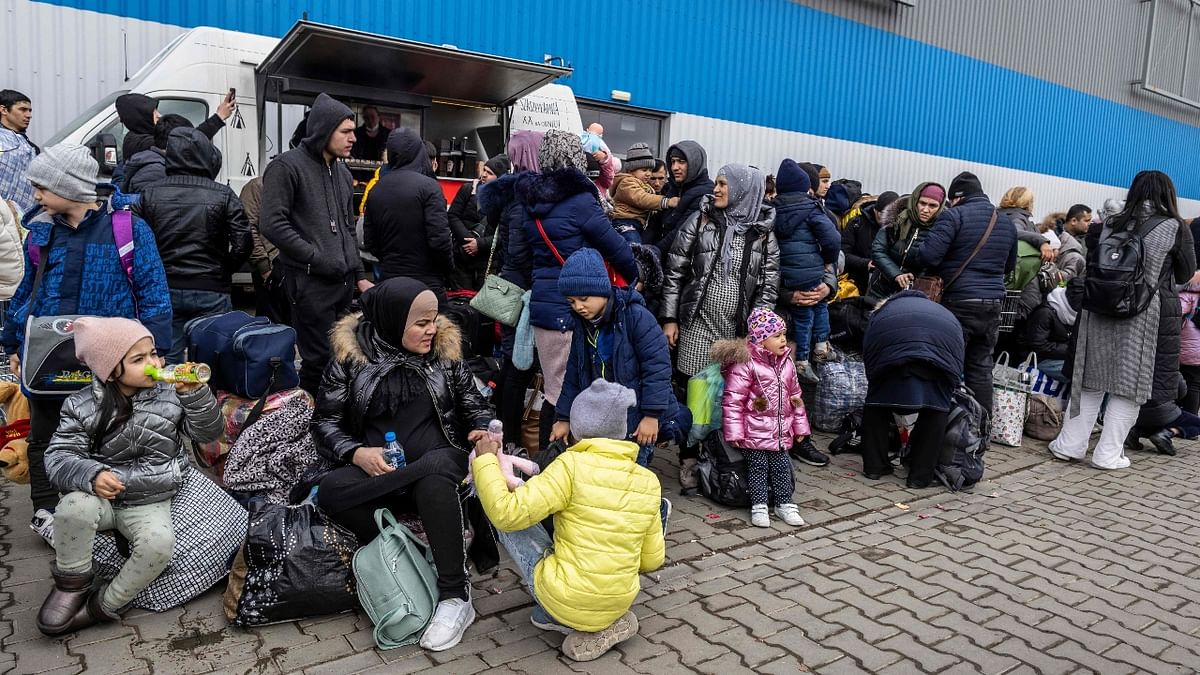 With men of conscription age obliged to stay and help in the defence, mostly women and children have crossed into the European Union from regional crossings leave their homes in search of a safer, better life. Here are some pictures of people fleeing war-torn Ukraine in resettlement hope. Credit: AFP Photo