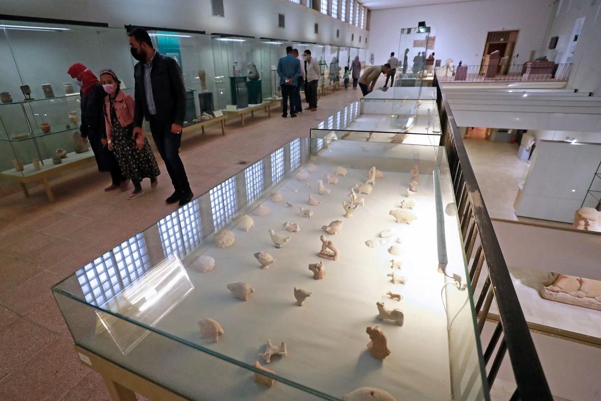 Visitors tour Iraq's National Museum in the capital Baghdad on March 8, 2022, as it reopens after a three-year closure due to the Covid-19 pandemic and political unrest. Credit: AFP Photo