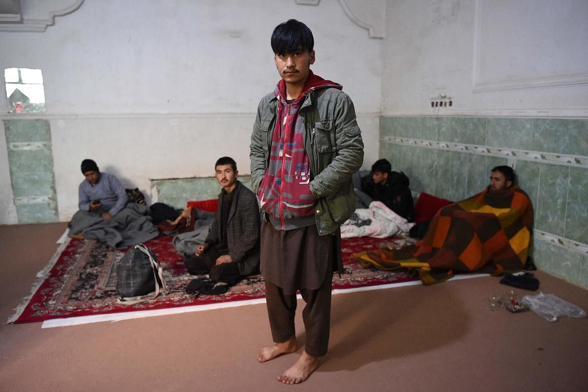 In Zaranj, a border town in southwestern Afghanistan, people smugglers say the flow of would-be exiles now reaches 5,000 to 6,000 a day -- four times more than before the Taliban's return to power in August. Credit: AFP Photo