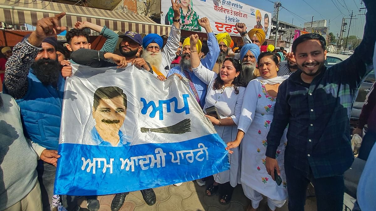 The multi-cornered electoral battle is heading for a comfortable victory for the AAP as the early trends gave an edge to the Bhagwant Mann-led party over the ruling Congress. The Shiromani Akali Dal was coming as the third party. Credit: PTI Photo