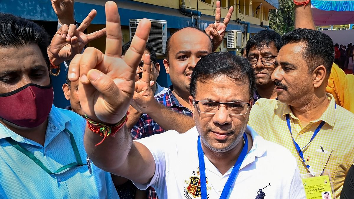 BJP leader Vishwajit Pratapsingh Rane flashes a victory sign as he meets the party workers in North Goa. Credit: PTI Photo