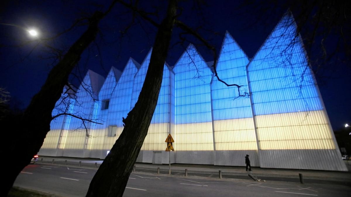 The building of Mieczyslaw Karlowicz Philharmonic Hall is seen lit in the colours of the Ukrainian flag, in Szczecin, Poland. Credit: Reuters photo