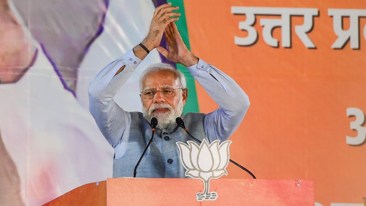 Narendra Modi addresses BJP leaders and workers during celebrations at the BJP Headquarters in New Delhi. Credit: PTI Photo