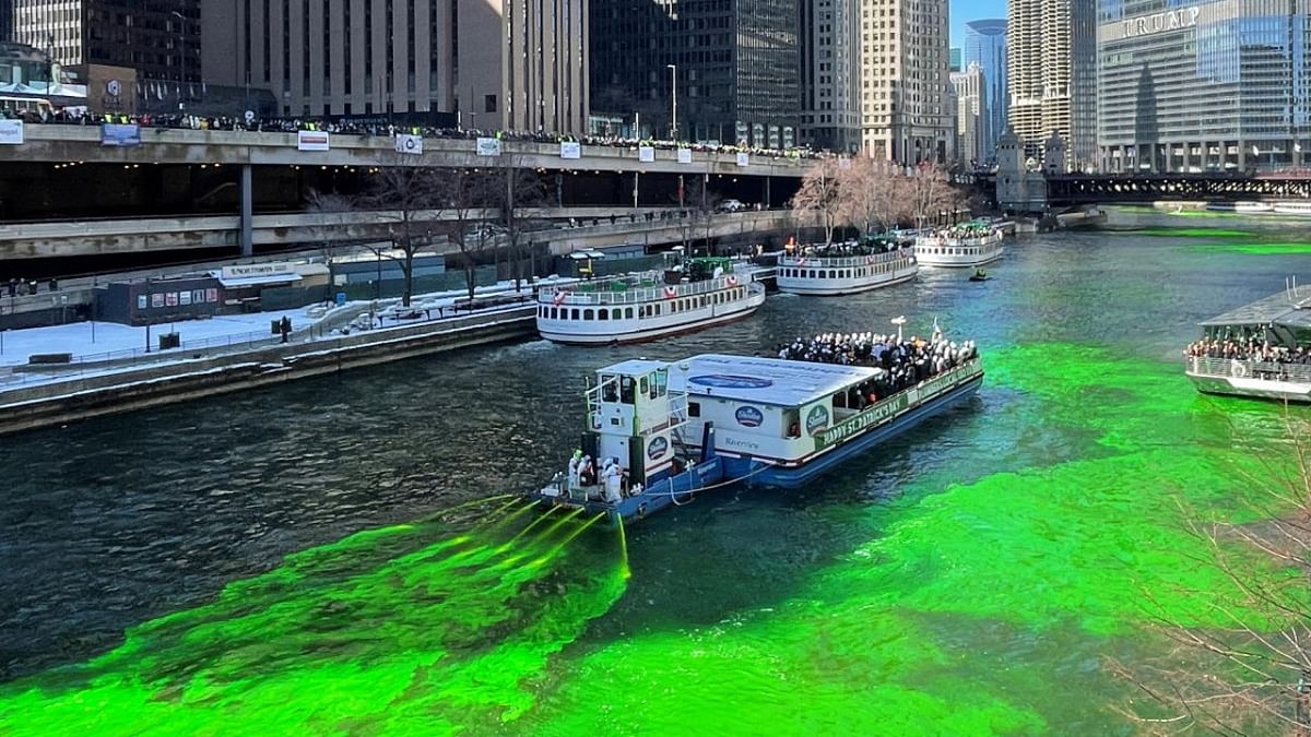 A barge sprays green dye into the Chicago River for it's traditional St. Patrick's Day festivities in Chicago, Illinois. Credit: Reuters photo