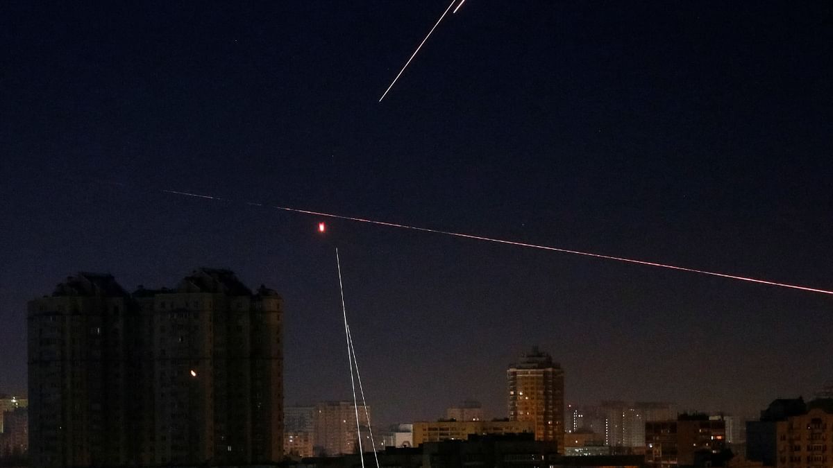 Tracers are seen in the night sky as Ukrainian servicemen fire on the drone as Russia's attack on Ukraine continues, in Kyiv. Credit: Reuters Photo