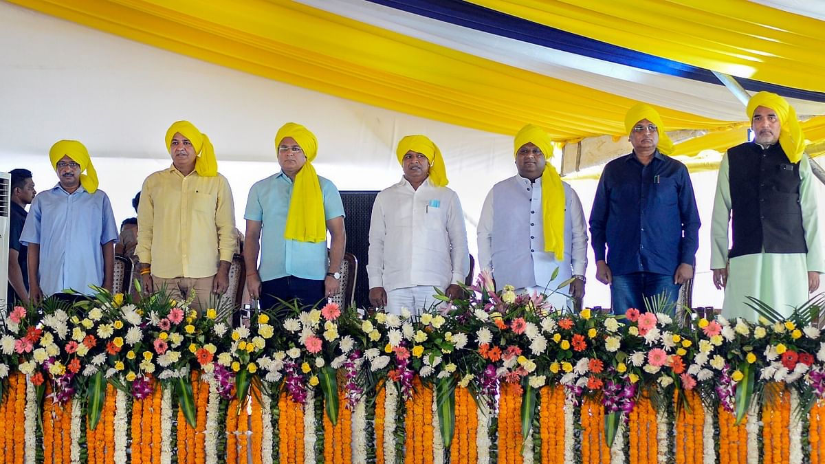 Delhi Chief Minister and AAP Convener Arvind Kejriwal with Deputy CM Manish Sisodia and others during AAP leader Bhagwant Mann's oath-taking ceremony, at Khatkar Kalan in Punjab. Credit: PTI Photo