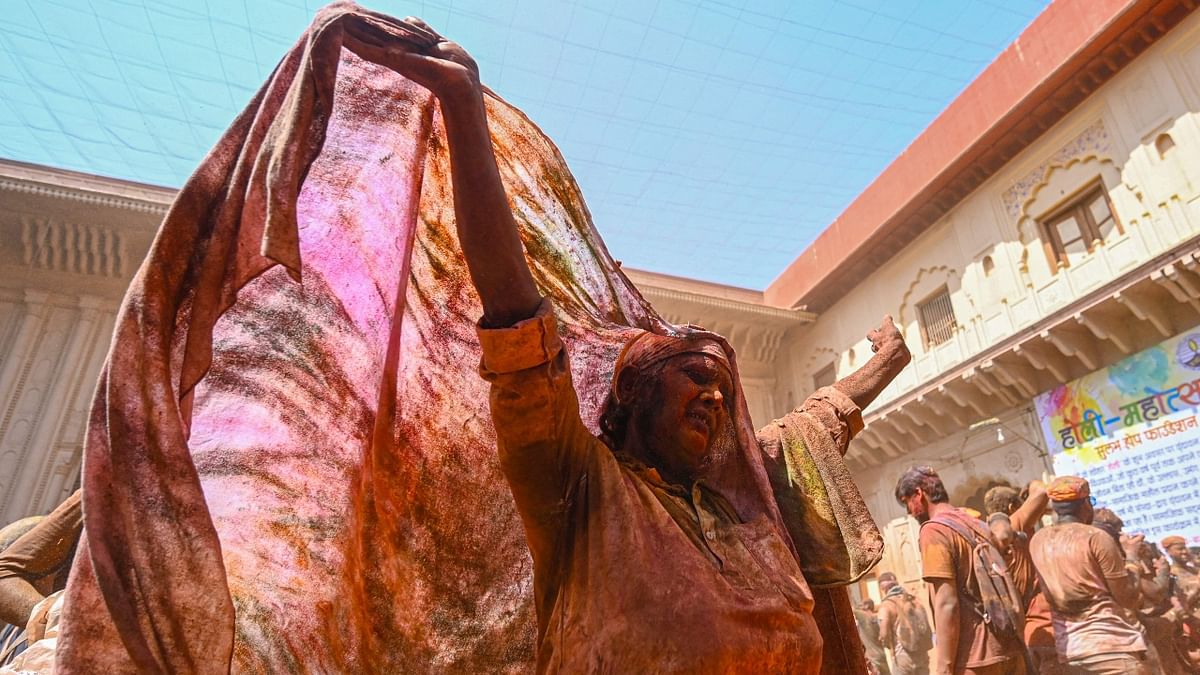 The idea of their participation in festive occasions has traditionally been taboo, and their participation in Holi celebrations only began a decade ago. Credit: AFP Photo