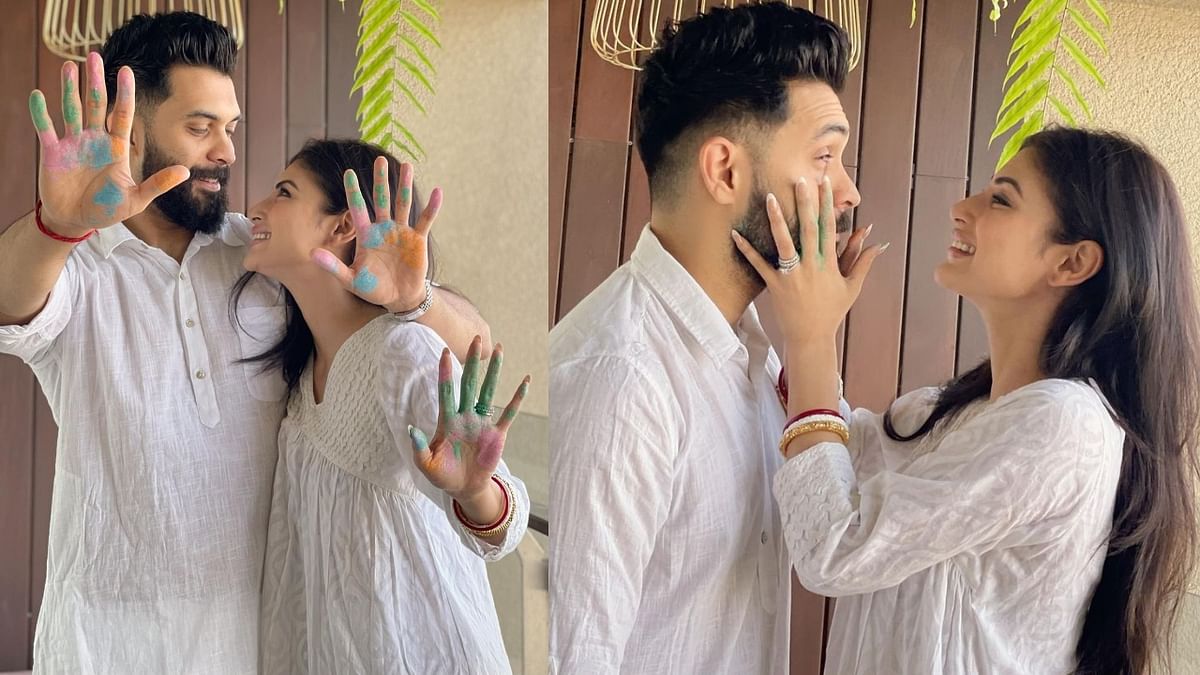Mouni Roy, who is celebrating her first Holi post-marriage, took to social media and shared a series of photos where she was seen playing Holi with her husband Suraj Nambiar. Credit: Instagram/imouniroy