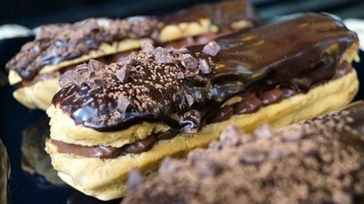 Dark chocolate & whisky eclair: As the name suggests, dark chocolate and whiskey eclair is a popular dessert and is robust and mature. Don't be deceived by its usual chocolate eclair look, its boozy punch leaves you to go gaga over it! Credit: Instagram/fine_dine_love