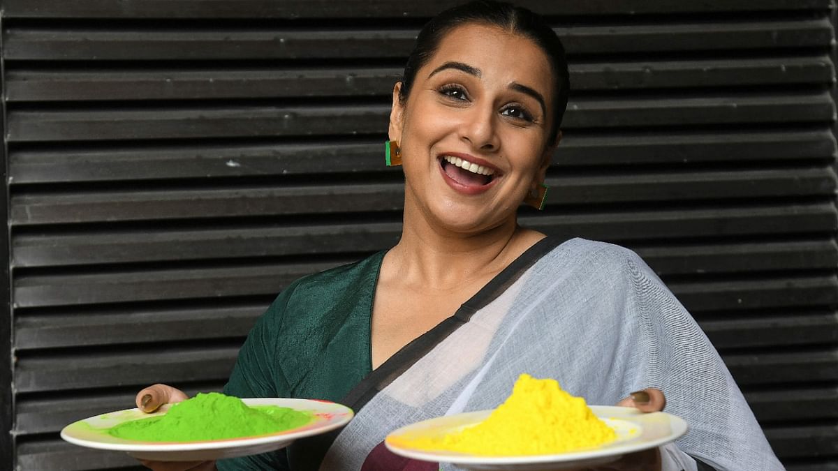 Bollywood actress Vidya Balan poses for pictures while holding Gulal (colour powder) for Holi celebrations during a promotion for the upcoming action comedy film 'Jalsa' in Mumbai. Credit: AFP Photo