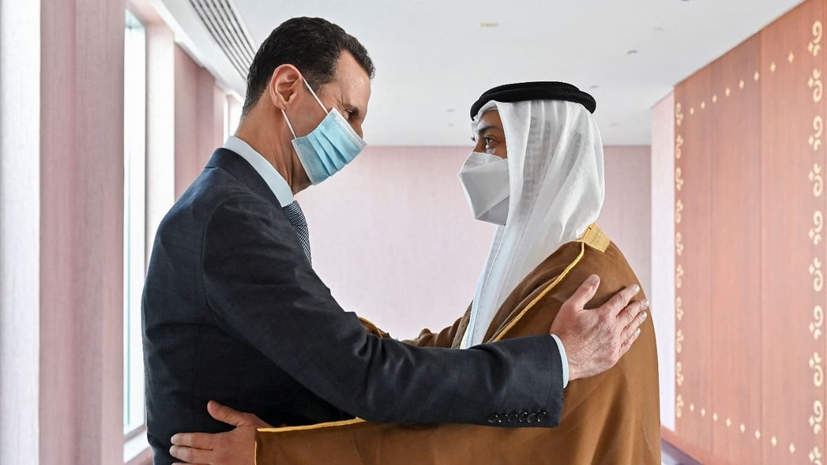 Syria's President Bashar al-Assad (L) being greeted by Sheikh Mansour bin Zayed Al Nahyan, UAE Deputy Prime Minister and Minister of Presidential Affairs , in the capital Abu Dhabi. Credit: AFP Photo