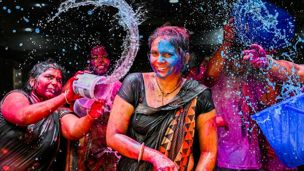 Women in Bengaluru play with water and colours on the occasion of Holi. Credit: DH Photo/M S Manjunath