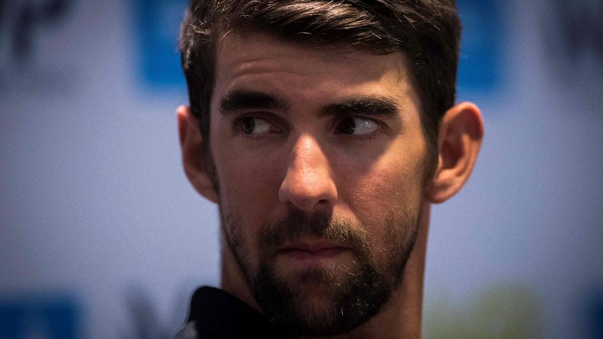 Former American swimming superstar Michael Phelps too spoke of the “weight of gold” in his documentary. Credit: AFP File Photo