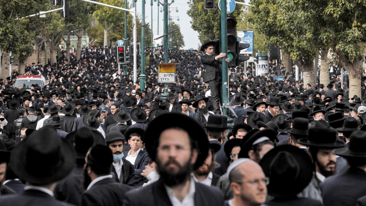 Ultra-Orthodox Jewish mourners gather to attend the funeral of Haredi rabbi Chaim Kanievsky in the Israeli city of Bnei Brak near Tel Aviv. Credit: AFP Photo