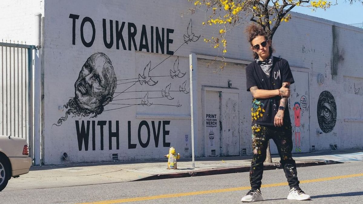Corie Mattie, a trailblazer in the LGBTQIA+ community, paints powerful graffiti in support of Ukraine. Credit: Instagram/coriemattie