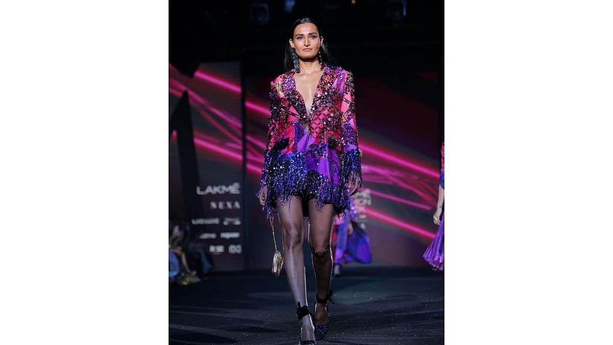 Manish Malhotra's “Diffuse” collection showcased geometric prints and metal detailing in pink and purple. Credit: Instagram/lakmefashionwk
